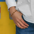 Golden Knot Link Bracelet — Bold Rectangular Knot Design