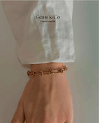 Golden Knot Link Bracelet — Bold Rectangular Knot Design